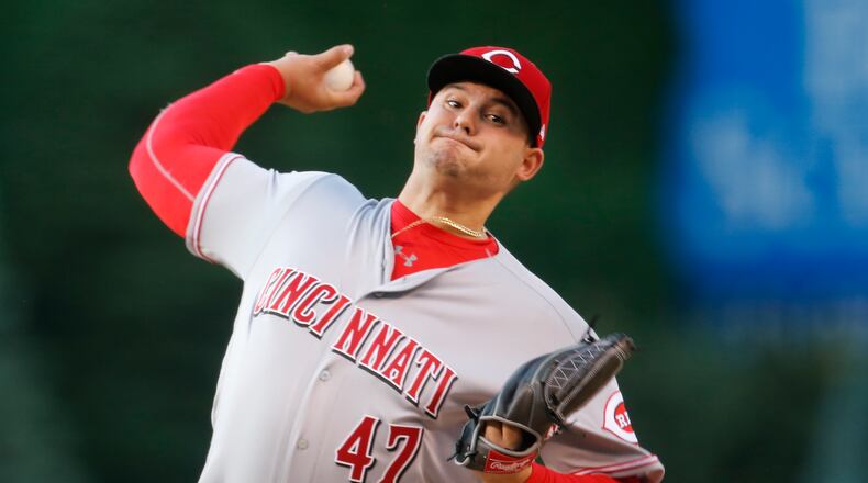 DENVER, CO - MAY 25: Sal Romano #47 of the Cincinnati Reds pitches against the Colorado Rockies in the first inning at Coors Field on May 25, 2018 in Denver, Colorado. (Photo by Joe Mahoney/Getty Images)