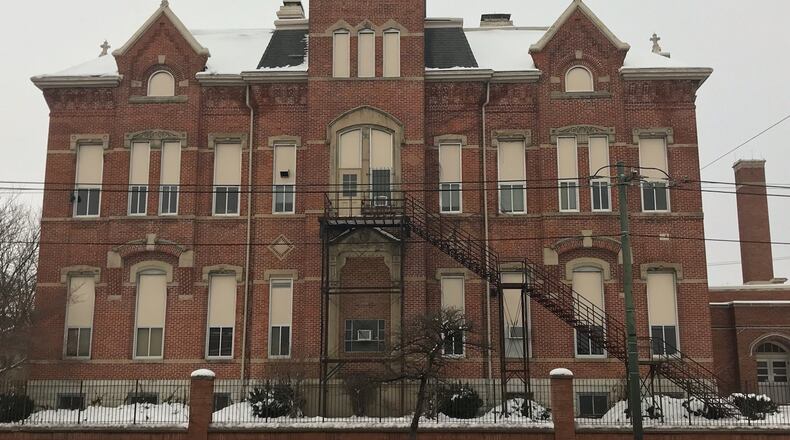 The former Longfellow Academy will be auctioned Feb. 15 by Dayton Public Schools. KAITLIN SCHROEDER