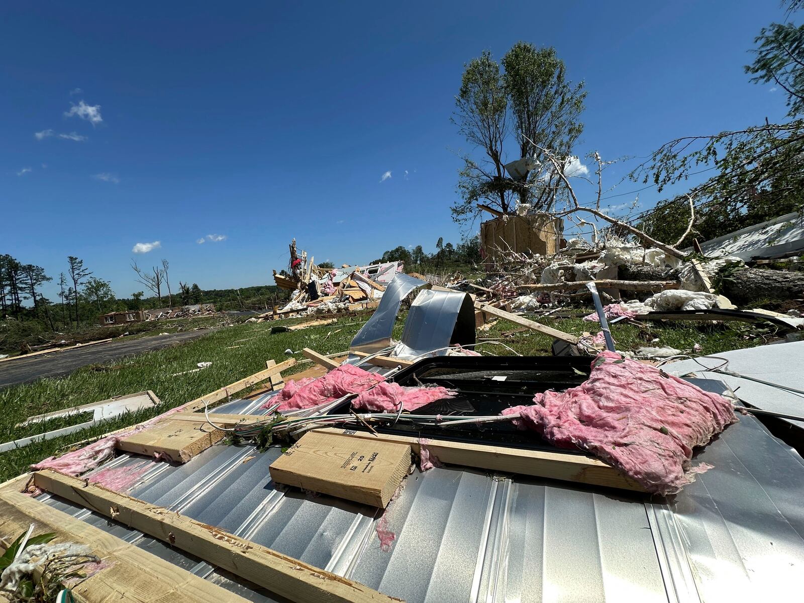 Houses lay destroyed following severe weather in London, Kentucky, Saturday, May 17, 2025. (AP Photo/Dylan Lovan)
