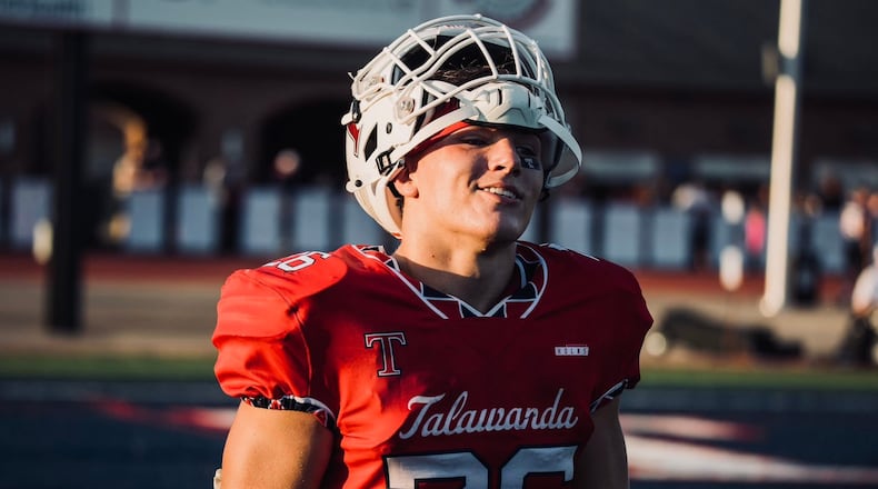 Talawanda running back Lance Cantrell smiles before taking the field against Taylor on Friday night. JORDAN PHILLIPS / CONTRIBUTED