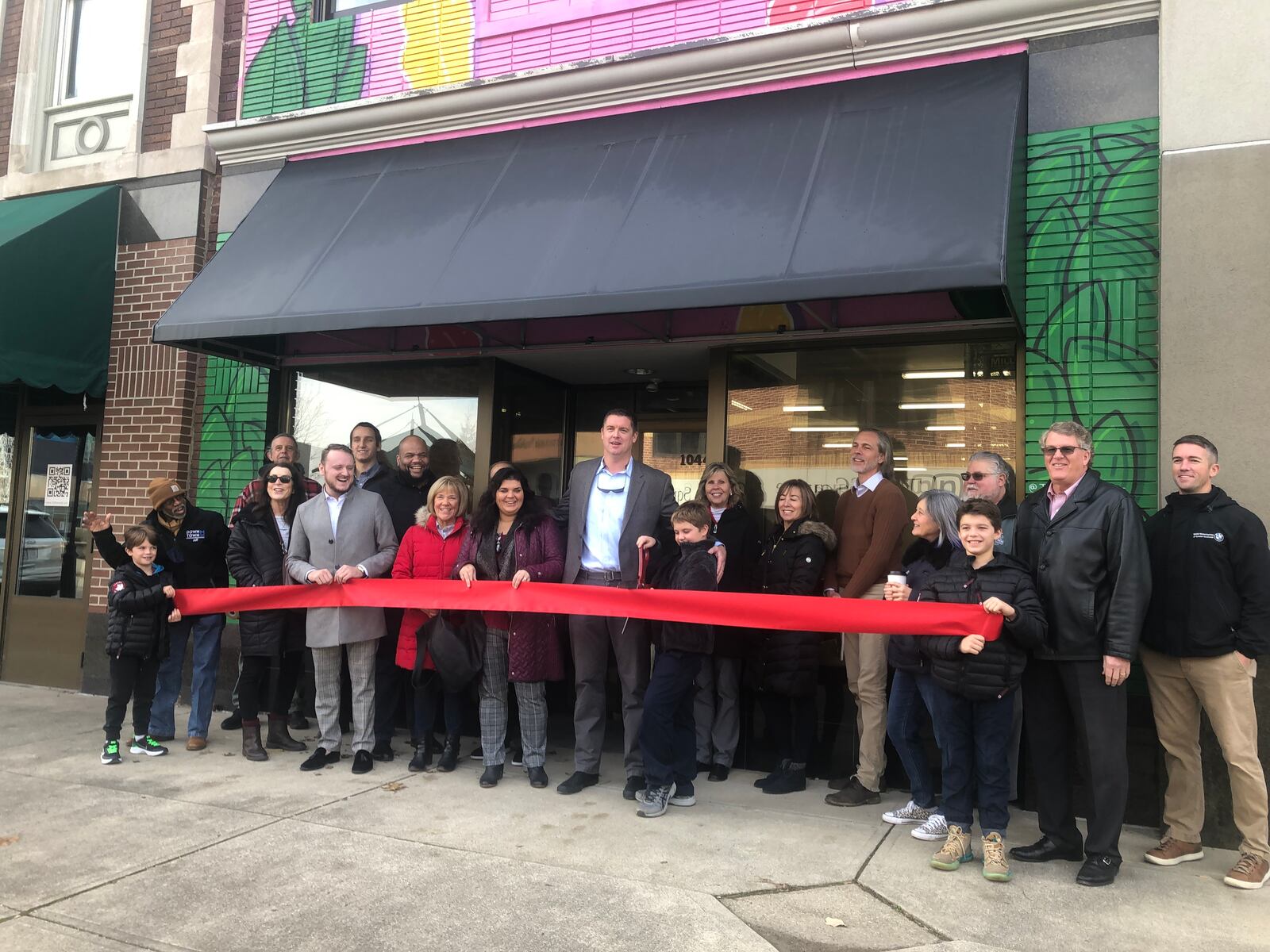 Local officials, developers and representatives from Downtown Middletown Inc. and the Chamber of Commerce Serving Middletown, Monroe and Trenton attended a ribbon-cutting last week to celebrate the opening of two apartments and retail space at 1044 Central Ave. RICK McCRABB/STAFF