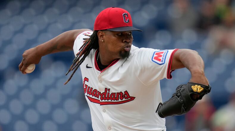 FILE - Cleveland Guardians' Luis Ortiz pitches in the first inning of a baseball game against the Minnesota Twins, in Cleveland, April 30, 2025. (AP Photo/Sue Ogrocki, File)