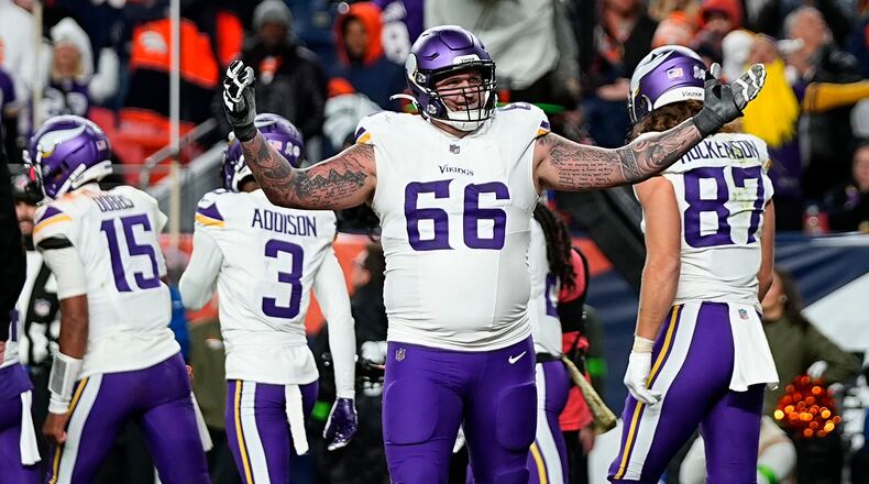Minnesota Vikings guard Dalton Risner (66) celebrates a touchdown against the Denver Broncos during the second half on an NFL football game, Sunday, Nov. 19, 2023, in Denver. (AP Photo/Jack Dempsey)