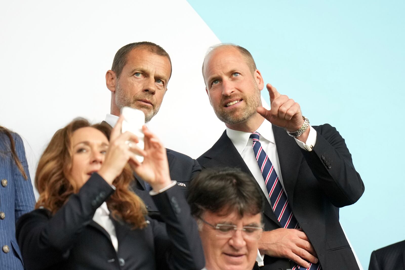 Britain's Prince William speaks to UEFA president Aleksander Ceferin, left, before the Women's Euro 2025 final soccer match between England and Spain at St. Jakob-Park in Basel, Switzerland, Sunday, July 27, 2025. (AP Photo/Alessandra Tarantino)