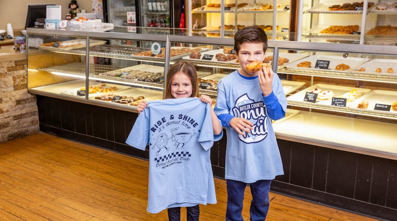 This year’s shirt is a light blue color and nods to nostalgia with a retro-inspired illustration on the back. CONTRIBUTED