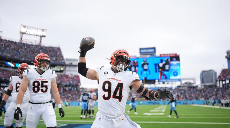 Cincinnati Bengals defensive end Sam Hubbard (94) celebrates a touchdown during the first half of an NFL football game against the Tennessee Titans, Sunday, Dec. 15, 2024, in Nashville, Tenn. (AP Photo/George Walker IV)