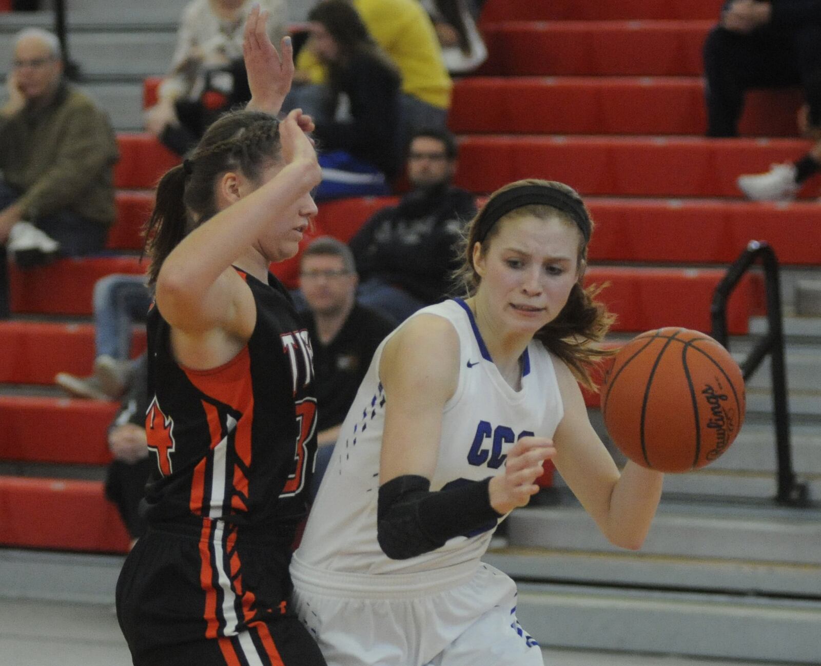 Cincinnati Christian’s Allie Statzer tries to dribble around Jackson Center’s Vanessa Winner on Saturday afternoon during a Division IV district final at Troy. MARC PENDLETON/STAFF