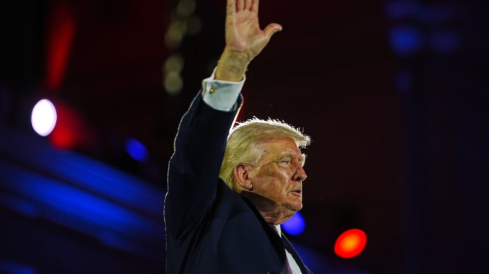 President Donald Trump waves after speaking at the National Republican Congressional Committee's (NRCC) annual fundraising dinner, Wednesday, March 25, 2026, at Union Station in Washington. (AP Photo/Julia Demaree Nikhinson)