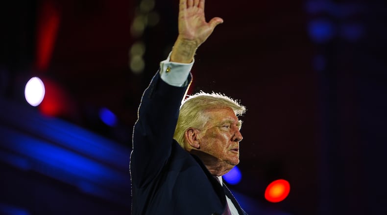 President Donald Trump waves after speaking at the National Republican Congressional Committee's (NRCC) annual fundraising dinner, Wednesday, March 25, 2026, at Union Station in Washington. (AP Photo/Julia Demaree Nikhinson)
