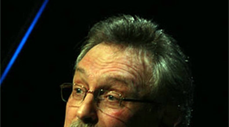 Mike Reid is a former Bengals star. He has musical skills, too. CONTRIBUTED