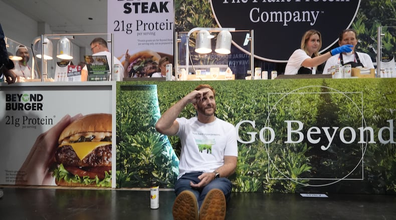 Beyond CEO Ethan Brown, the company's founder, poses for a photo at his Beyond booth as the company is transitioning from Beyond Meat to just Beyond, to introduce a new line of sparkling plant‑protein drinks at the Natural Products Expo West 2026 at the Anaheim Convention Center in Anaheim, Calif., on Thursday, March 5, 2026. (AP Photo/Damian Dovarganes)