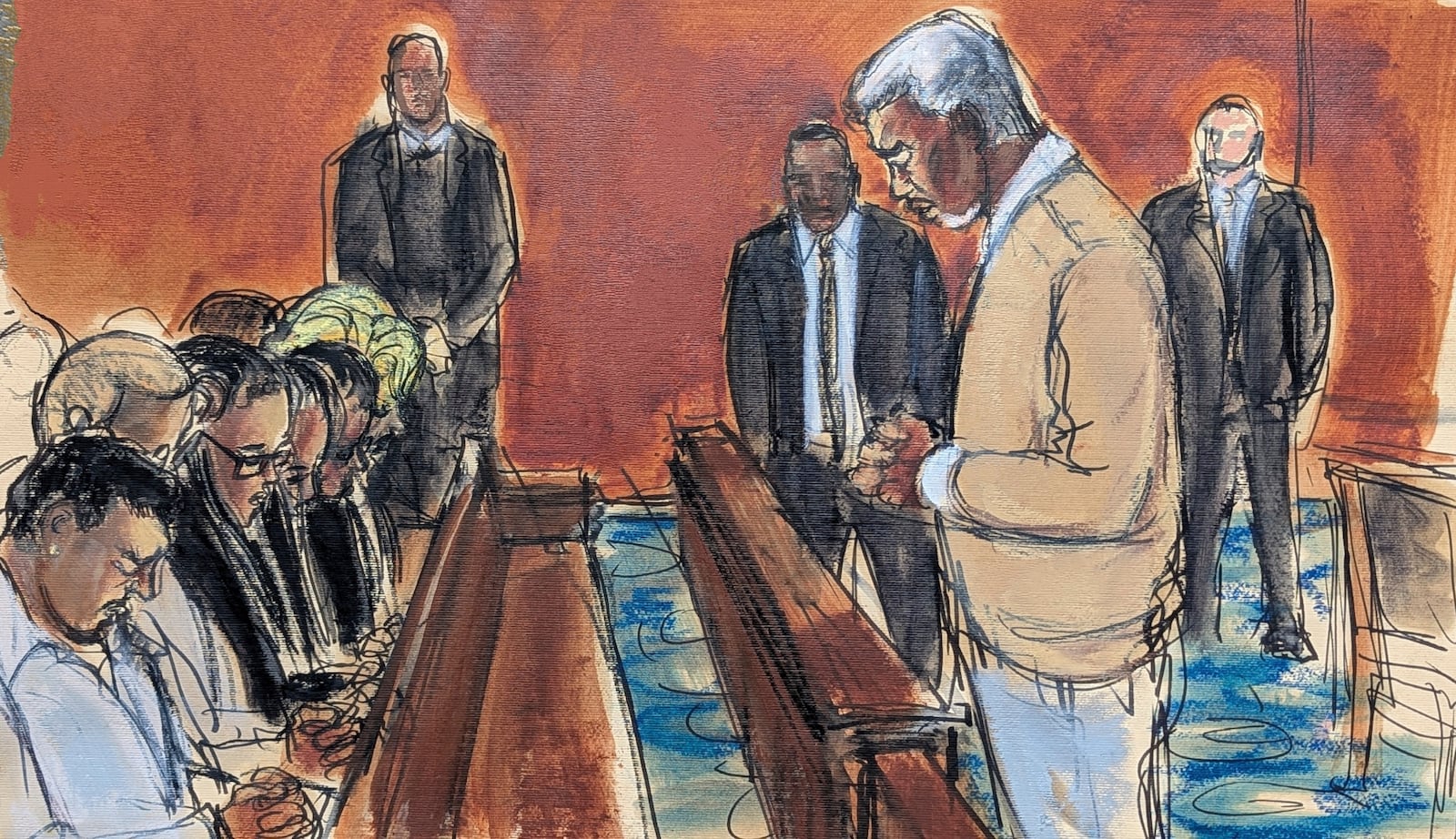 In this courtroom sketch, Sean "Diddy" Combs, rights, leads his family in a prayer before the verdict was read, convicting him of prostitution-related offenses but acquitting him of sex trafficking and racketeering charges, Wednesday, July 2, 2025, in Manhattan federal court in New York. (Elizabeth Williams via AP)