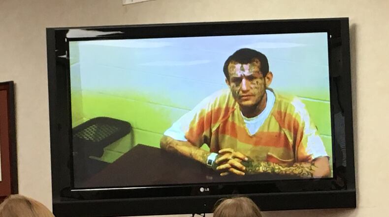 Ebb Duhamel was arraigned via video July 10 in Franklin Municipal Court on charges of aggravated menacing, inducing panic and violating a protection order stemming from a July 4 standoff at a Franklin Twp. home. Duhamel, 30, of Middletown, evaded police that night but was apprehended following a two-hour standoff with Middletown police the next day. ED RICHTER/STAFF