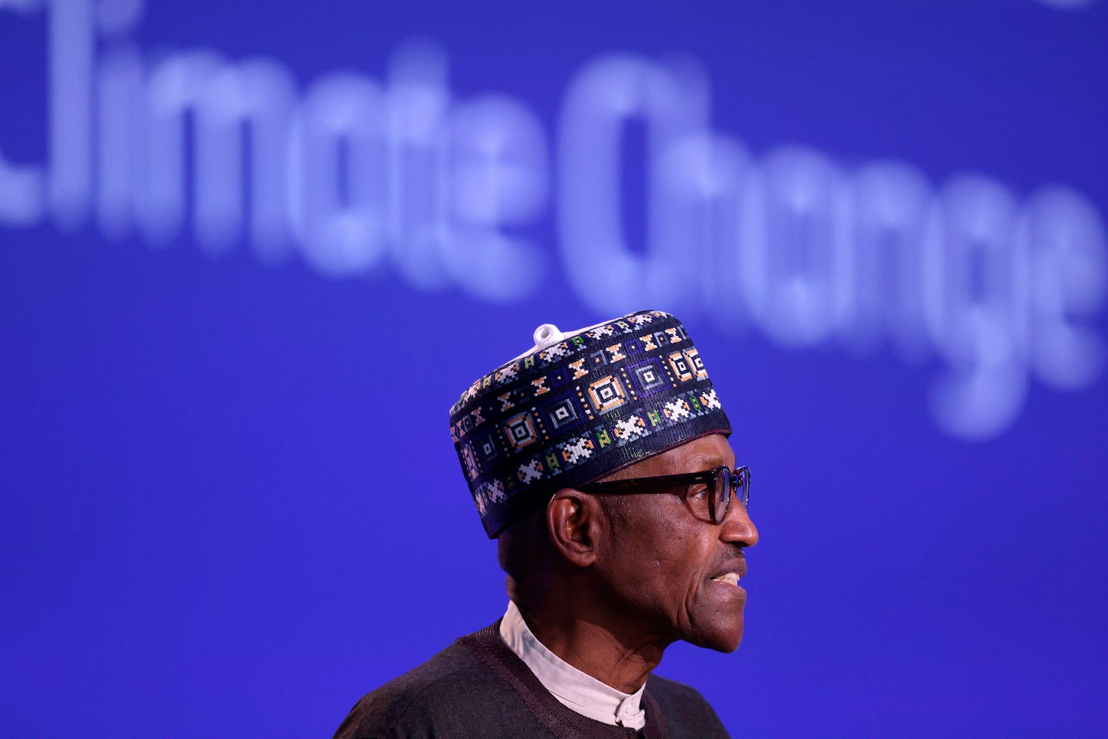 FILE - Nigeria's President Muhammadu Buhari speaks during the UN Climate Change Conference COP26 in Glasgow, Scotland, Tuesday, Nov. 2, 2021. (Adrian Dennis/Pool Photo via AP, File)