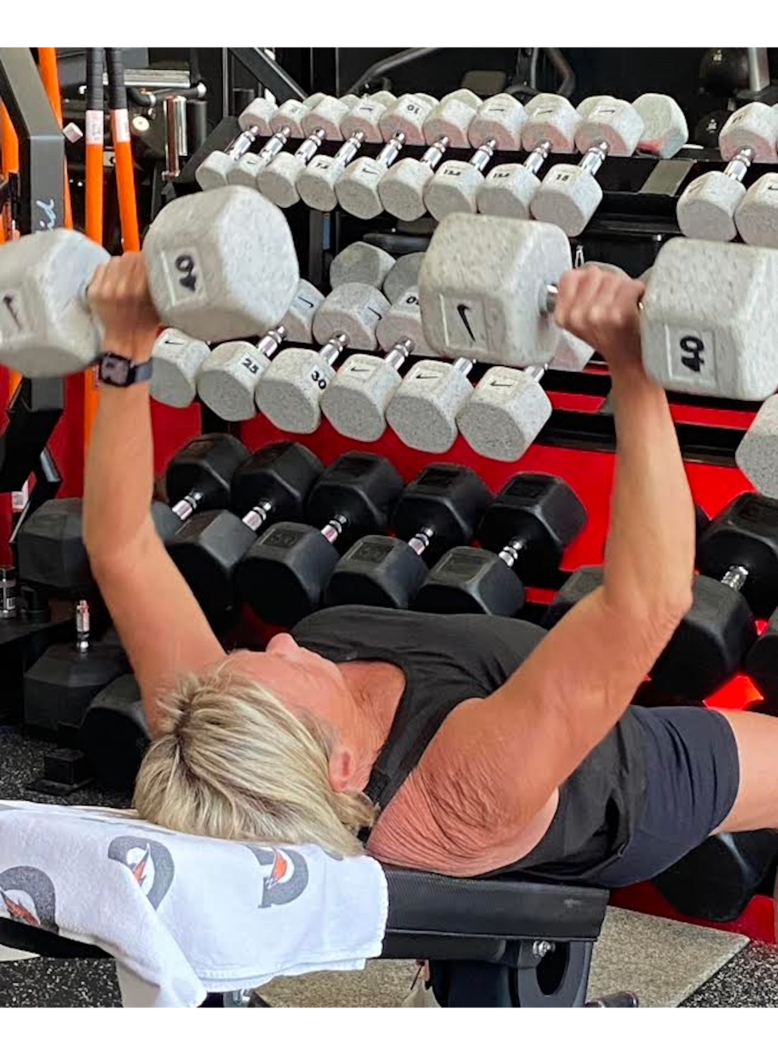 As part of her regular upper-body workout, "Grambo" Marcy Schade lifts 40-pound free weights. CONTRIBUTED