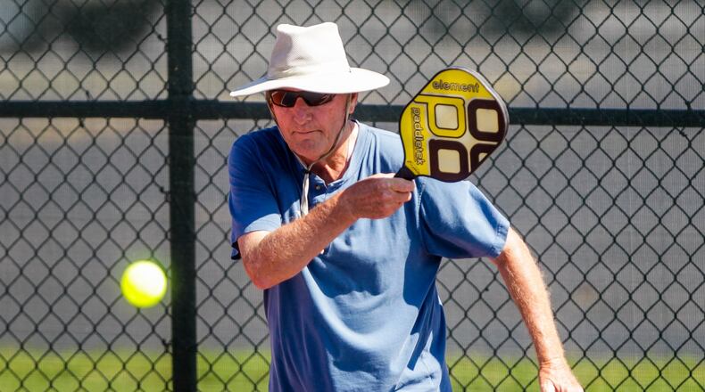 Larry Woebkenberg plays pickleball Friday, July 12 at the Middletown Pickleball Association courts at Lefferson Park in Middletown. The 12th Annual Middletown Senior Pickleball Tournament is August 1-3 and over 270 players from 8 states are registered to play. Free lessons are offered every Wednesday at 6:00 pm for those interested in playing but new to the sport. Paddles and balls are available to use for those that do not have their own. NICK GRAHAM/STAFF