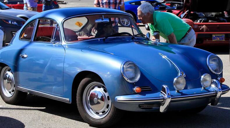 Bill Myers pulls out in his Porsche 356 at Cars & Coffee.
© 2014 Photograph by Skip Peterson