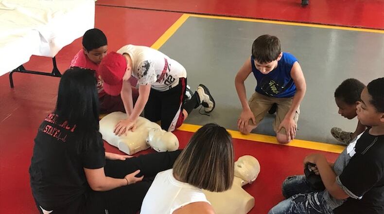 Middletown Division of Fire recently held its first Fire Camp for selected students entering the sixth grade. The fire camp was a partnership among the Division of Fire, Community Building Institute and Middletown City Schools. The camp was facilitated by Middletown Firefighters and Middletown City Schools staff members. The camp focused on positive behaviors, good decision-making, team building, peer communication, civic engagement, and physical activity while providing a fun and exploratory environment. Participants were also taught about the duties of a firefighter/paramedic entail. The camp is designed to help students gather tools for a positive transition to the sixth grade. CONTRIBUTED/CITY OF MIDDLETOWN