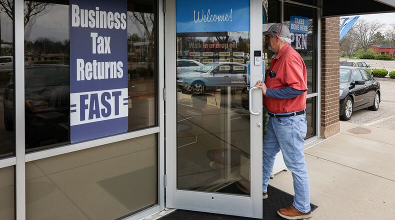 A man walks into Jackson Hewitt on Wilmington Pike in Kettering. Tax Day is April 15. BRYANT BILLING / STAFF