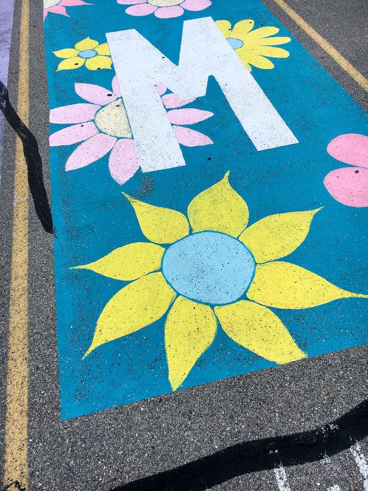 PHOTOS Lakota East seniors paint parking spots
