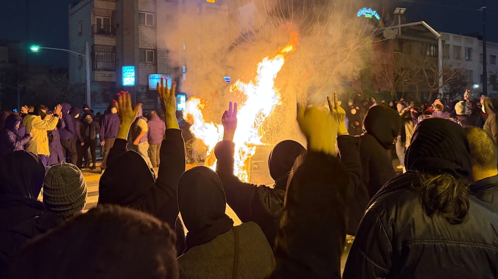 Iranians attend an anti-government protest in Tehran, Iran, Friday, Jan. 9, 2026. (AP Photo)