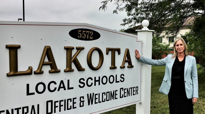 After a quarter of a century of working as a treasurer for Ohio public school districts - the last dozen with Lakota Schools - widely acclaimed financial officer Jenni Logan has retired. Logan, a former Ohio Treasurer of the Year, says her mother's pioneering career last century as a school treasurer inspired her own career. (Photo By Michael D. Clark\Journal-News)