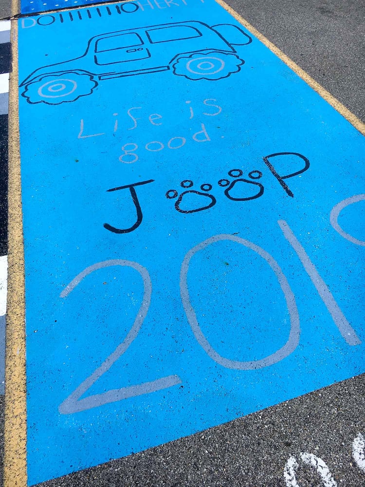 PHOTOS Lakota East seniors paint parking spots