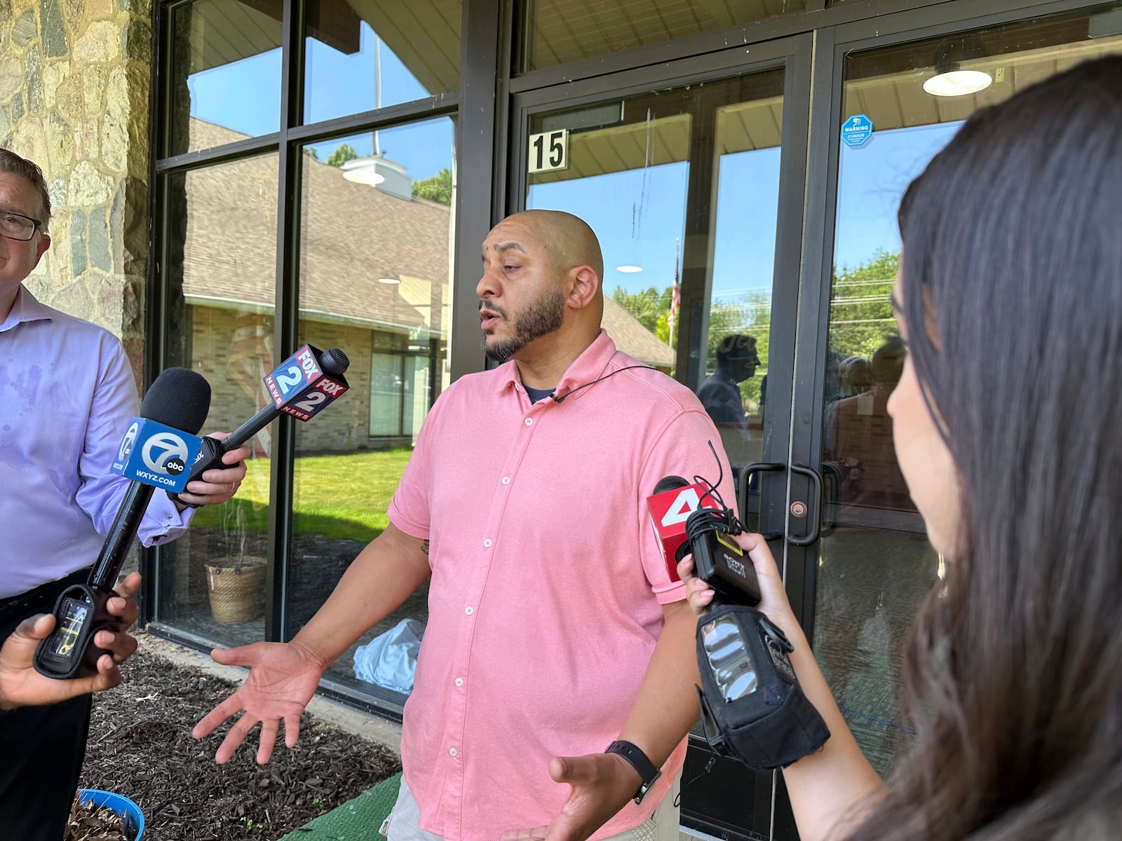 Pastor Bobby Kelly of CrossPointe Community Church in Wayne, Mich., speaks to reporters on June 23, 2025. (AP Photo/Ed White)