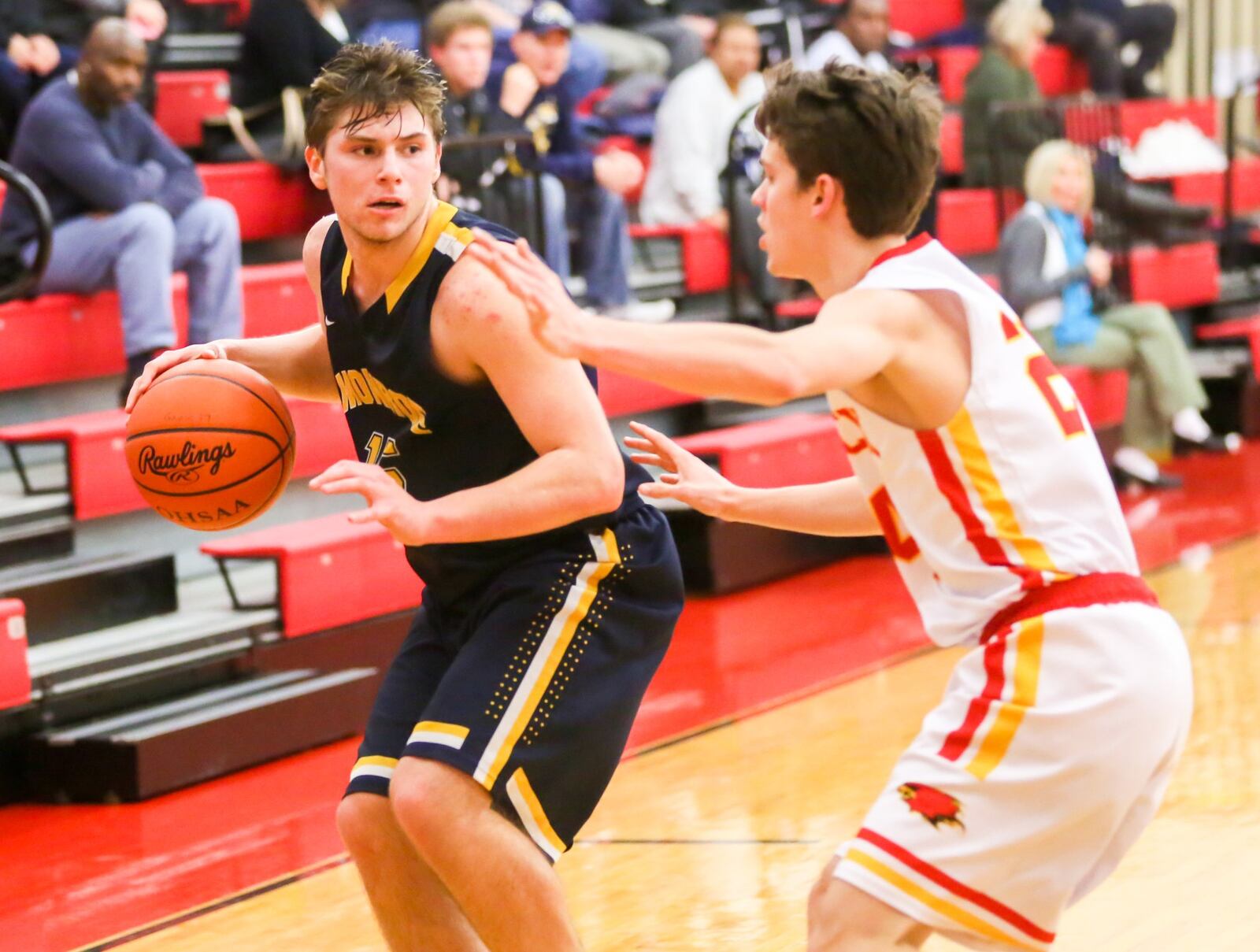 Monroe forward Lawrence Puleo (15) looks to find an open teammate as Fenwick’s David Luers defends Tuesday night at Fenwick. GREG LYNCH/STAFF