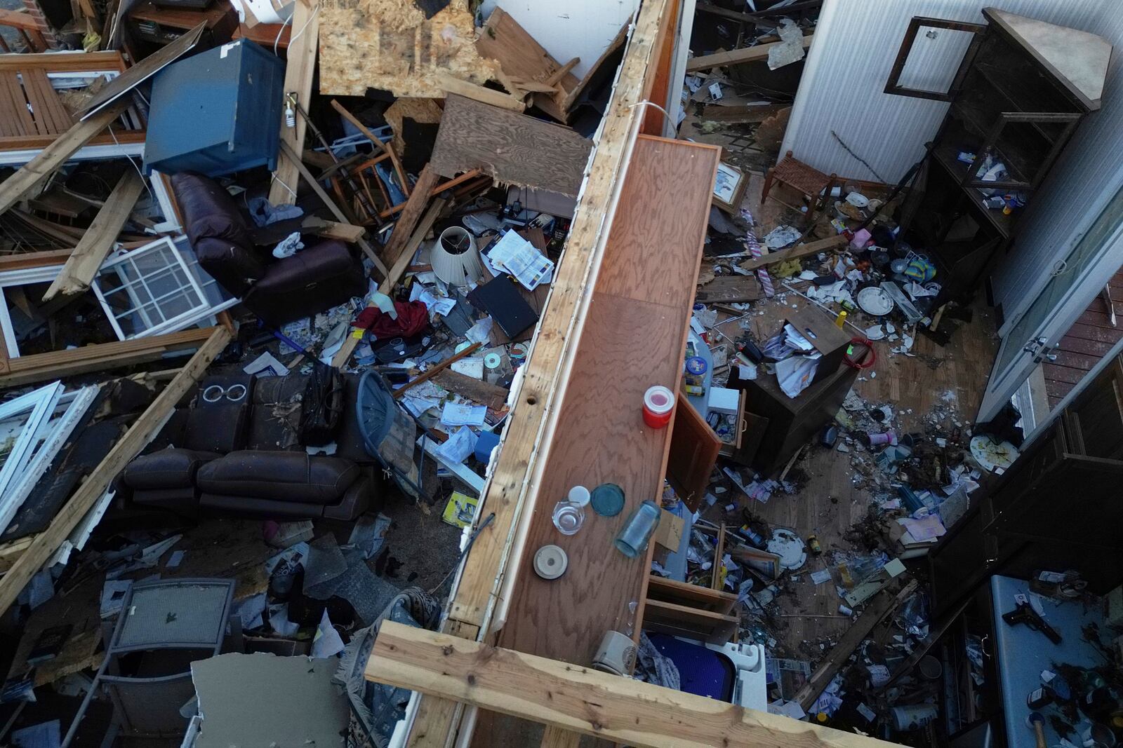 A destoryed home is seen from above after a severe storm passed through the area, Saturday, May 17, 2025, in London, Ky. (AP Photo/Carolyn Kaster)