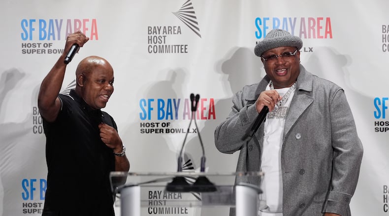 Rappers Too Short, left, and E-40 speak during a Bay Area Host Committee news conference for the NFL Super Bowl football game in San Francisco, Monday, Feb. 2, 2026. (AP Photo/Jeff Chiu)