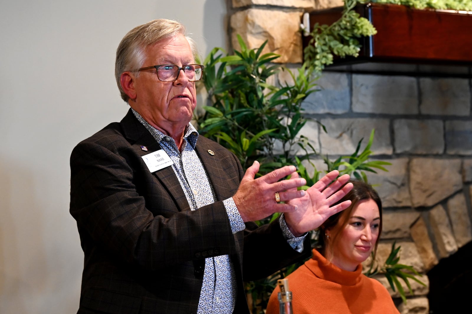 Hamilton City Councilman Tim Naab reacts to an comment during a debate at the Hamilton Rotary Club on  Oct. 9, 2025. On Tuesday, Nov. 4, 2025, Naab was re-elected to Hamilton City Council, earning one of the three seats to be filled. MICHAEL D. PITMAN/STAFF