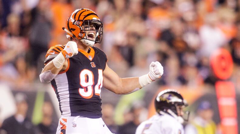 Cincinnati Bengals defensive end Sam Hubbard celebrates a take down of Baltimore Ravens quarterback Joe Flacco Thursday, Sept. 13 at Paul Brown Stadium in Cincinnati. The Cincinnati Bengals defeated the Baltimore Ravens 34-23. NICK GRAHAM/STAFF