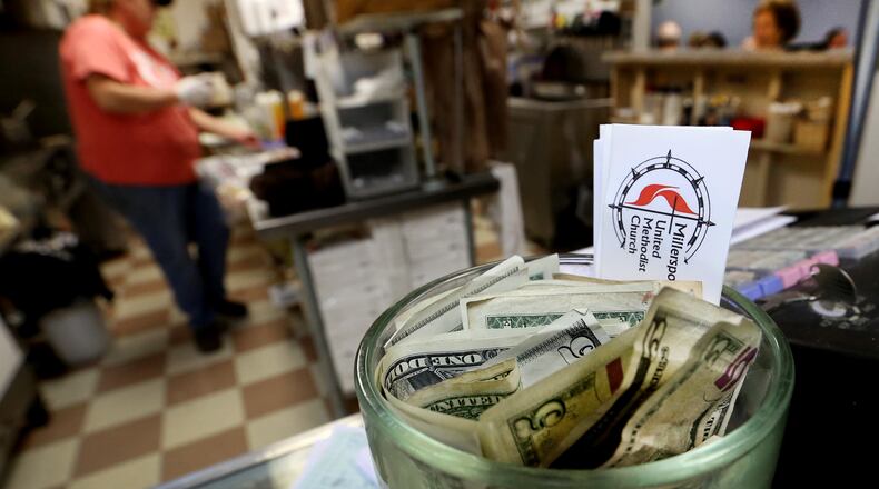 A full tips jar at Sammy J’s in Millersport, Ohio. Columbus Dispatch photo by Fred Squillante