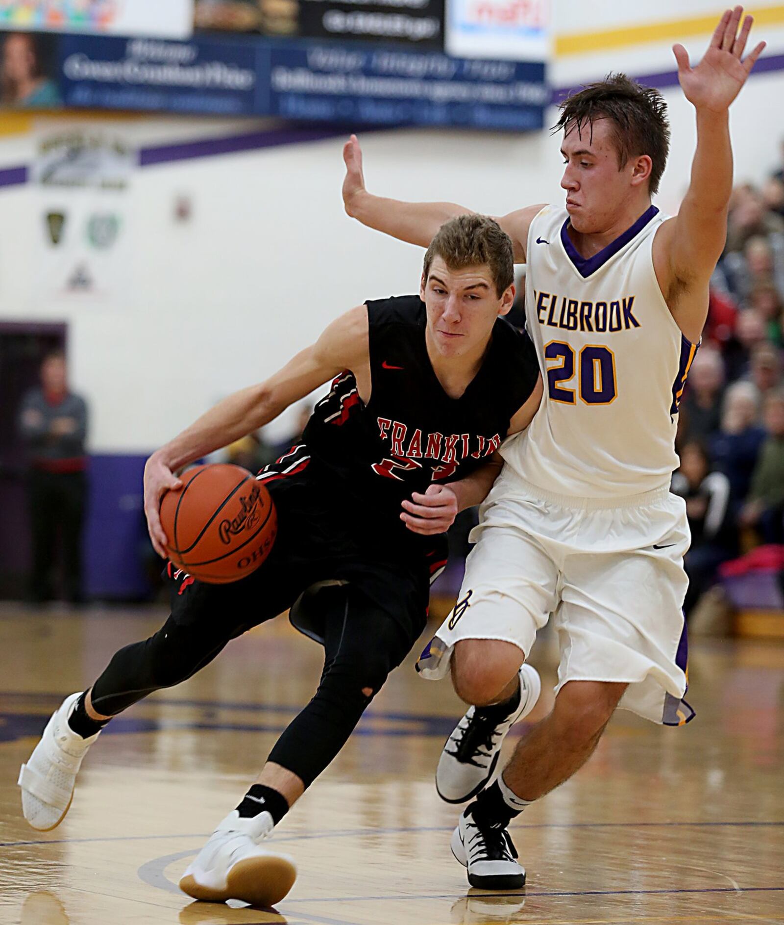 Franklin’s Jared Kinzer is guarded closely by Bellbrook’s Donnie Crouch on Friday night at Bellbrook. CONTRIBUTED PHOTO BY E.L. HUBBARD