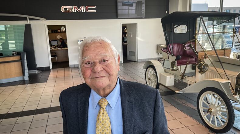 Gene Reichard, 88, is the owner of Reichard Buick-GMC in Dayton. Reichard started working at the dealership when he was 16 years old. JIM NOELKER.STAFF