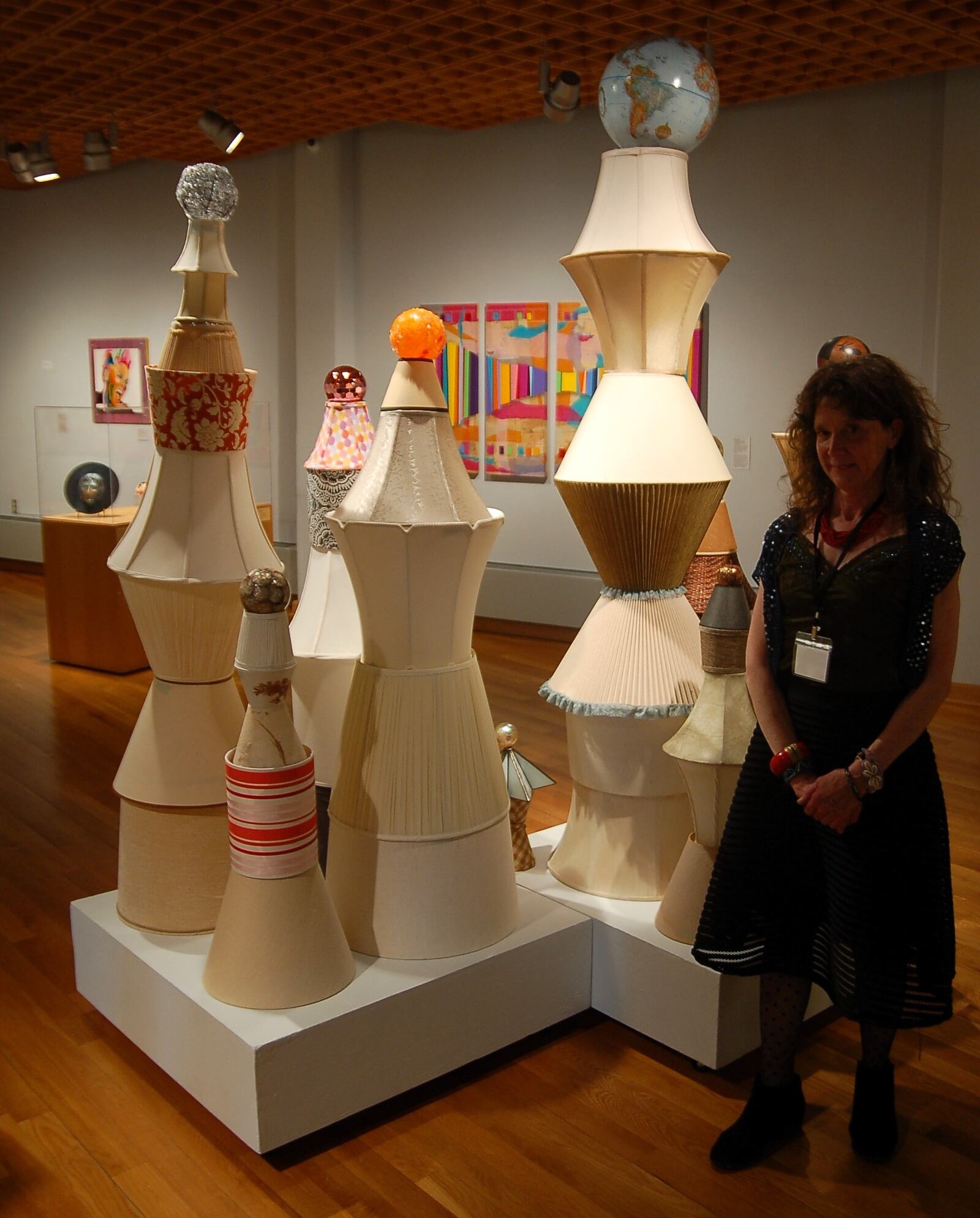 Artist Lori Park poses with her installation in the Bever West Gallery at the Fitton Center for Creative Arts May 11, during the opening celebration for the 30th Anniversary Member Show exhibition. The 30th Anniversary Fitton Member Show will be on view through July 12 at the Fitton Center for Creative Arts, 101 S. Monument Ave., Hamilton. CONTRIBUTED