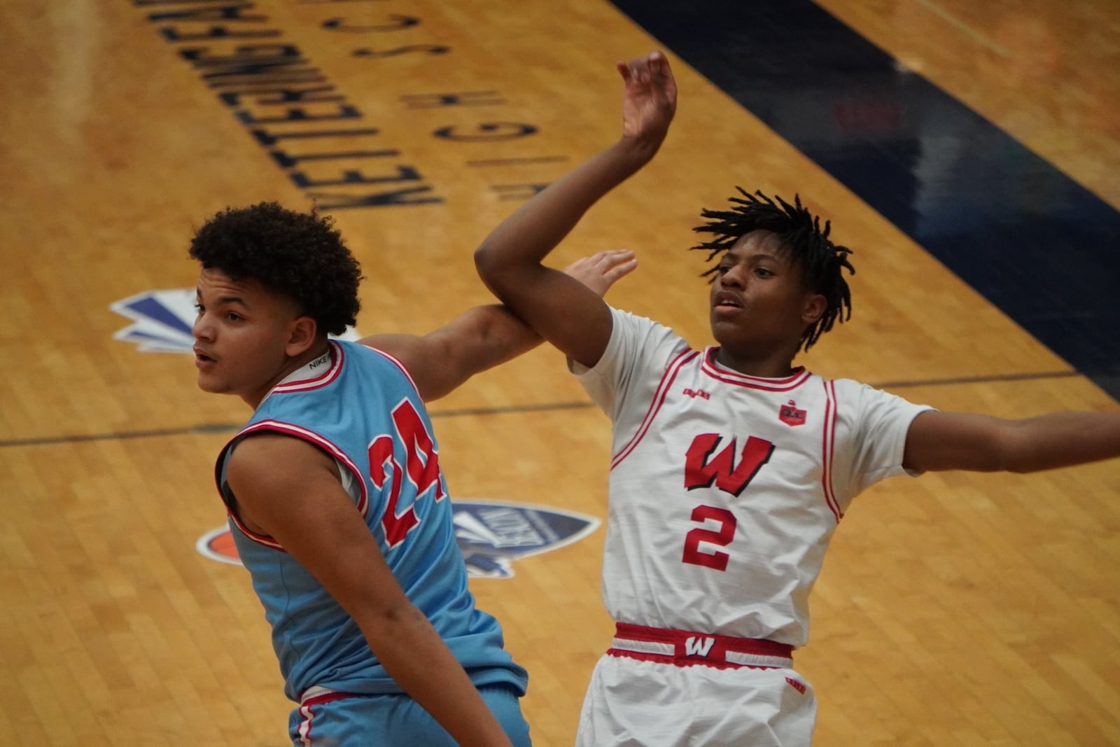 Lakota West's Joshua Tyson (2) puts up a shot over Fairmont's Jayden McGraw (24) at the 22nd Annual The Beacon Orthopedics Flyin’ to the Hoop Invitational on Monday, Jan. 20, 2025 at Trent Arena. CHRIS VOGT / CONTRIBUTED
