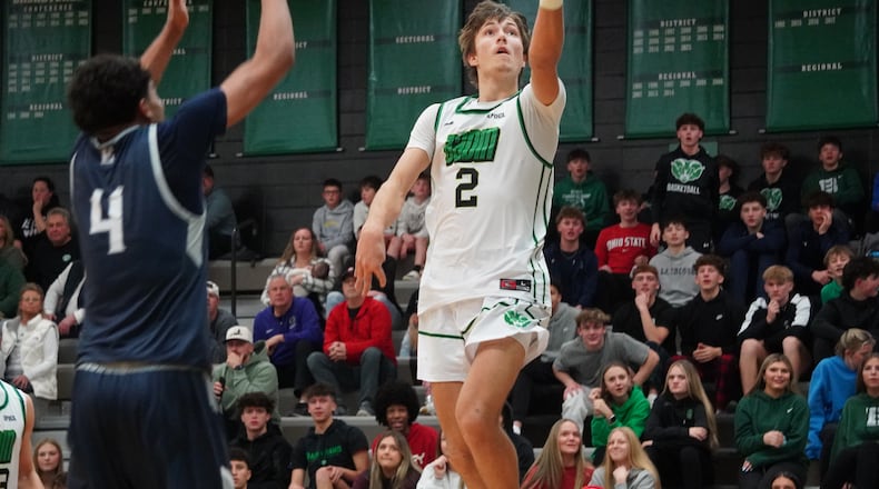 Badin’s Carson Lowe goes up to the hoop against Edgewood on Monday night at Mulcahey Gym in Hamilton. CHRIS VOGT / CONTRIBUTED