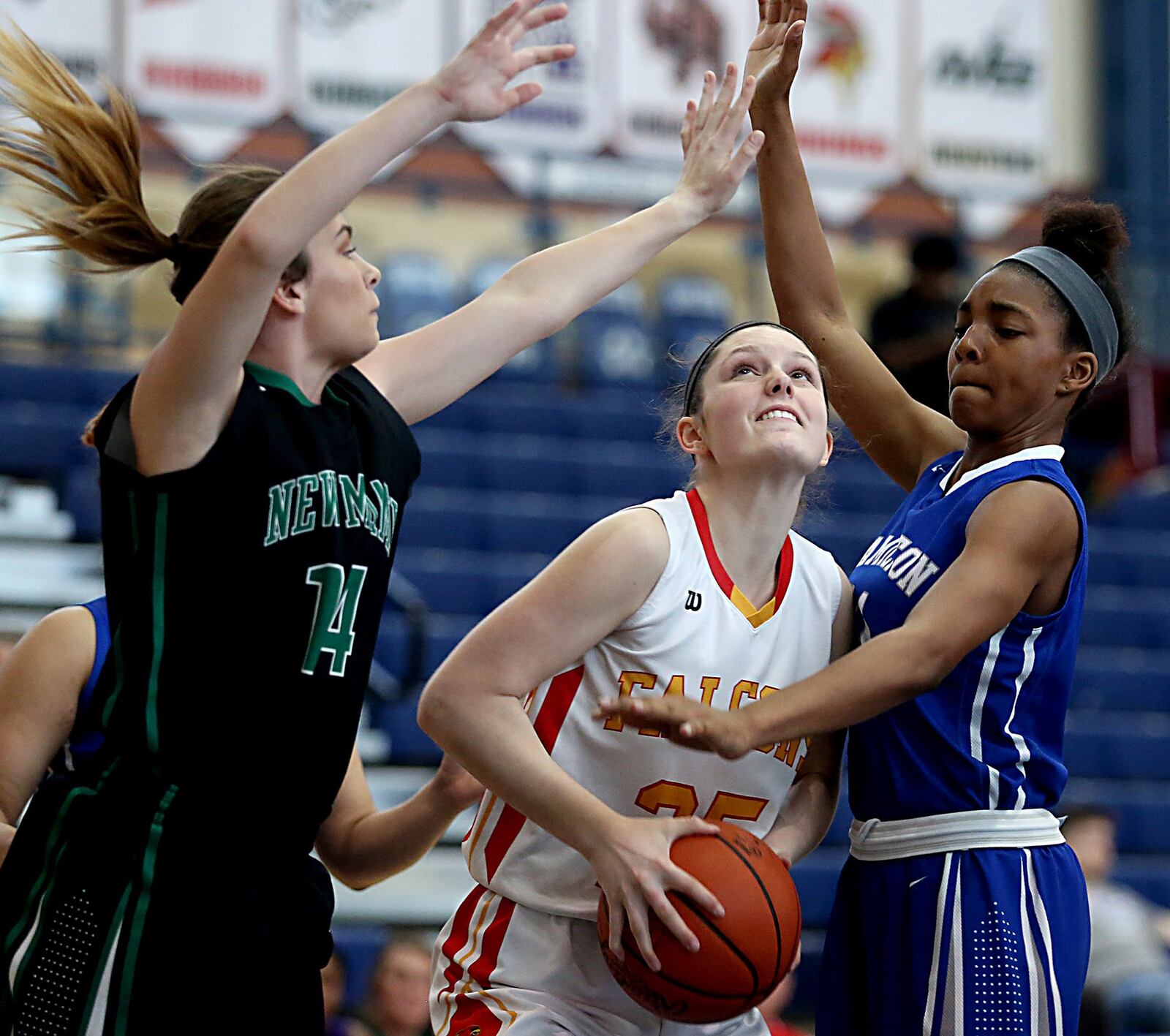 Fenwick’s Kaitlyn Anzel is surrounded by New Miami’s Allison Rapier (left) and Hamilton’s Cici Riggins during the inaugural All-Butler County All-Star girls basketball game at the Hamilton Athletic Center on Saturday. CONTRIBUTED PHOTO BY E.L. HUBBARD