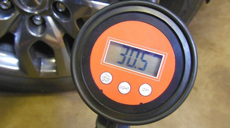 Digital tire pressure gauges are not only more accurate than other types, but they are easier to read and can display inflation pressure within 0.1 PSI making it easy to inflate all tires to the exact same pressure. James Halderman photo