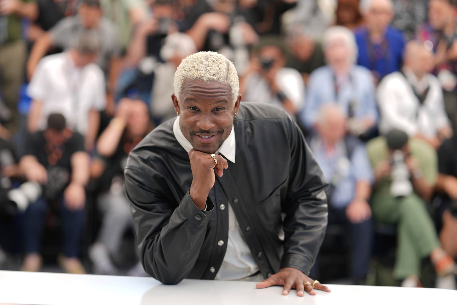 Director Akinola Davies poses for photographers at the photo call for the film 'My Father's Shadow' at the 78th international film festival, Cannes, southern France, Sunday, May 18, 2025. (AP Photo/Natacha Pisarenko)