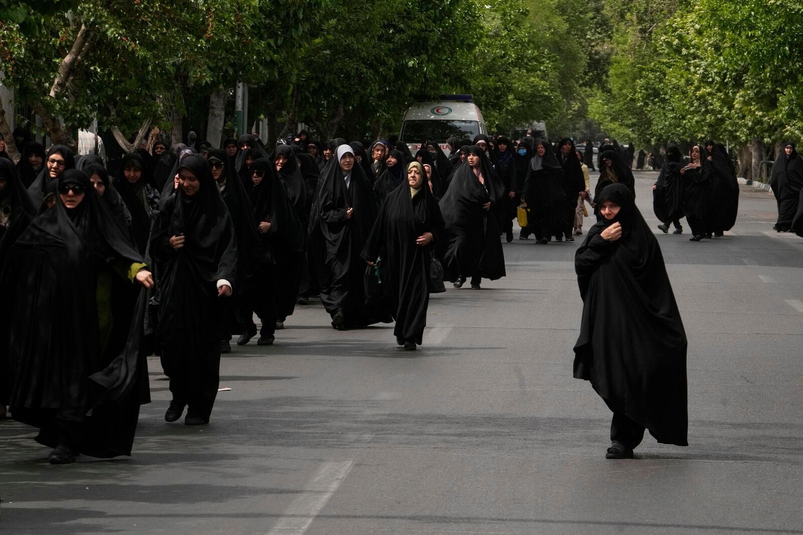 Worshippers leave after the conclusion of the Friday prayers, in Tehran, Iran, Friday, April 25, 2025. (AP Photo/Vahid Salemi)