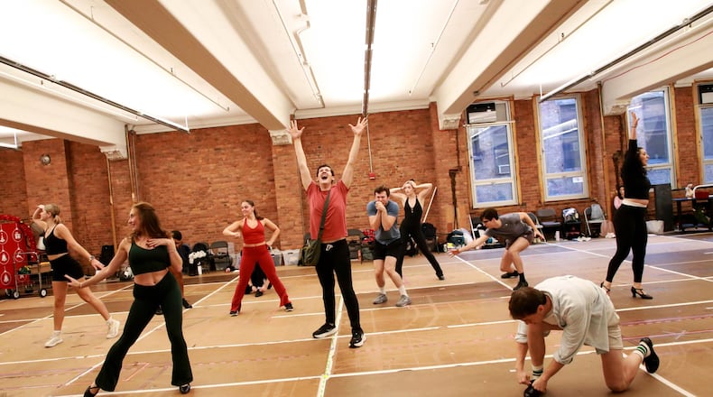 The cast of the new touring version of "Elf The Musical" preparing for its opening show on Saturday, Nov. 1 at the Clark State Performing Arts Center.