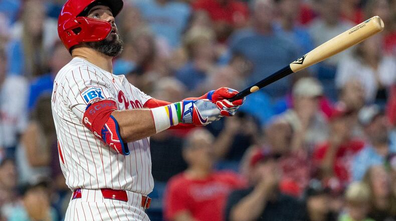 Philadelphia Phillies designated hitter Kyle Schwarber watches the ball after hitting a solo home run in the first inning of a baseball game against the Miami Marlins, Tuesday, Sept. 23, 2025, in Philadelphia. (AP Photo/Laurence Kesterson)