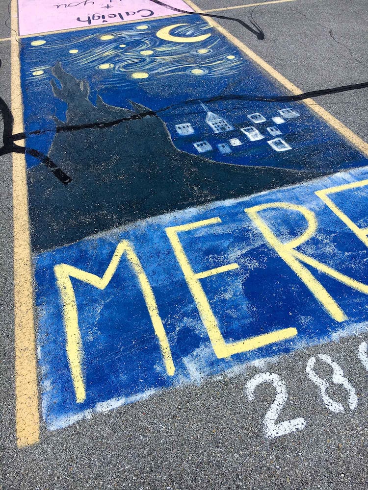 PHOTOS Lakota East seniors paint parking spots