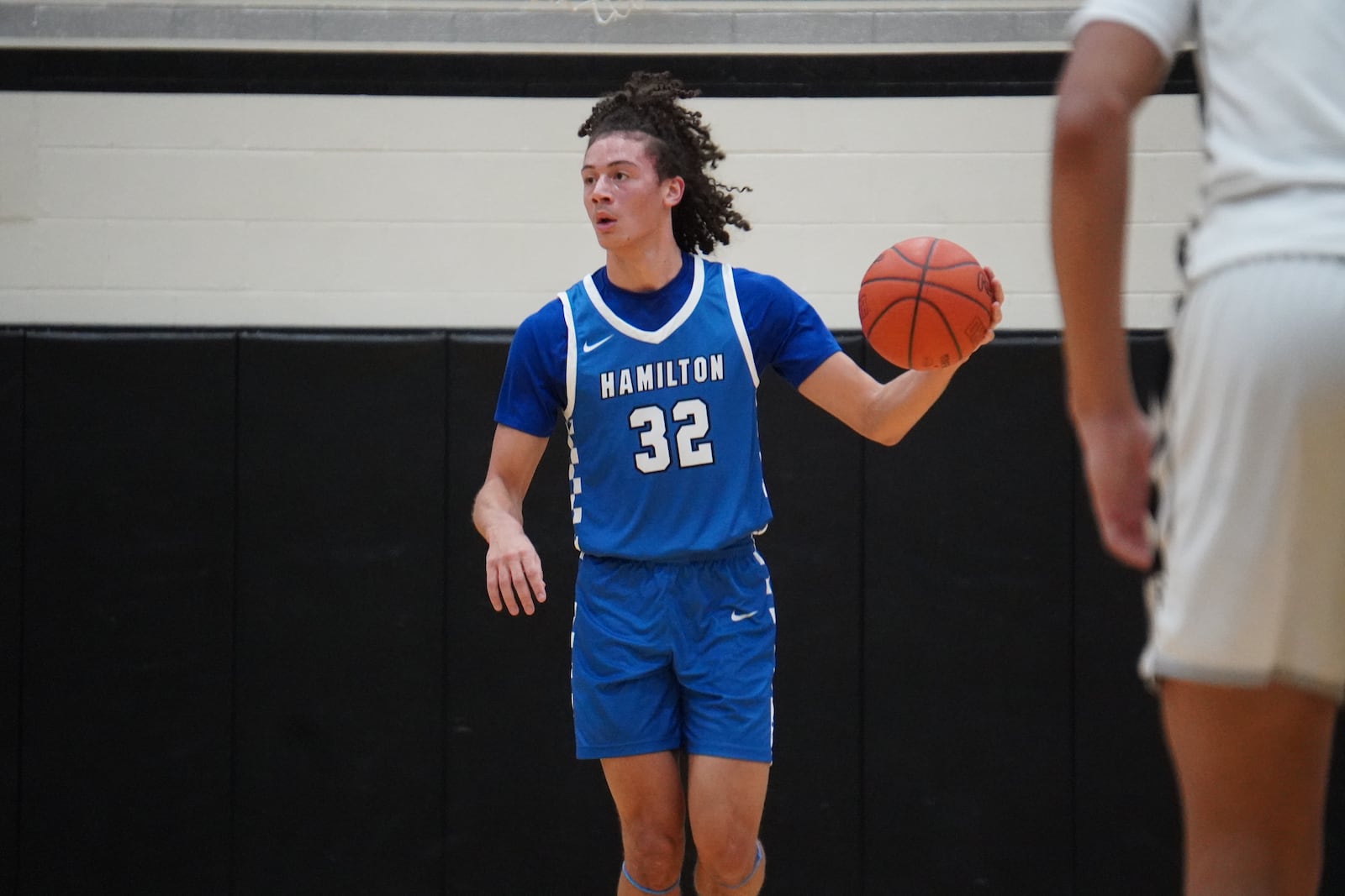 Hamilton’s RJ Wilson dribbles the ball up court against Lakota East on Friday night at Lakota East. CHRIS VOGT / CONTRIBUTED