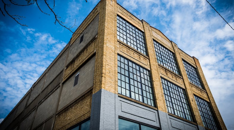 80 Acres Farms is now producing tomatoes in downtown Hamilton. They purchased the former Miami Motor Car Co. building on S. 2nd Street in February 2017 and have renovated it to create an indoor farm facility. NICK GRAHAM/STAFF