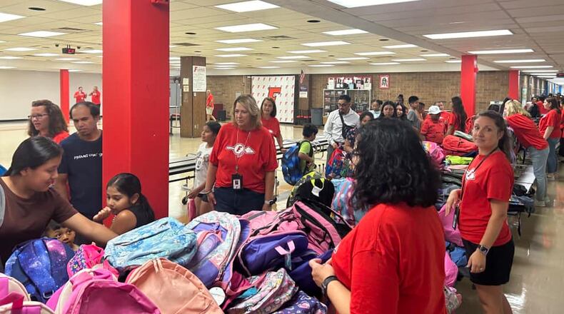 A new student backpack fundraising partnership between Fairfield Schools and a Fairfield Chamber of Commerce leadership program is giving residents a chance to donate to make sure students next school year have the learning supplies they need. Pictured is last year's giveaway under a different program. (Provided)