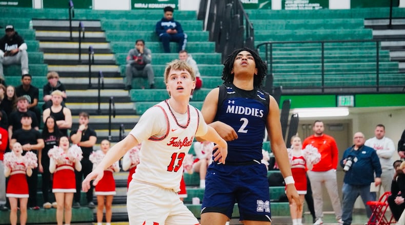 MIddletown's Jeremiah Landers (2) puts up a shot over Fairfield's Riley Cunningham (15) during their tournament game on Tuesday night at Mason. Chris Vogt/CONTRIBUTED